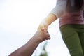 Help Concept Young girl Hands reaching out to help old Royalty Free Stock Photo