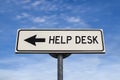 Help desk support concept. White sign with arrow - Help desk. Direction sign. Arrows on a pole pointing in one Royalty Free Stock Photo