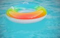 Help for drowning person. Rubber circle, swimming pool. Summertime.