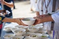 Help with feeding homeless people to alleviate hunger. poverty concept Royalty Free Stock Photo