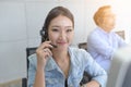 Help line answering and telemarketing. Female caller or receptionist phone operator. Royalty Free Stock Photo