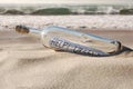 Help message in a bottle Royalty Free Stock Photo