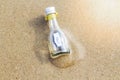 `HELP` message in glass bottle Royalty Free Stock Photo