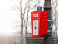 Help or police call button. SOS. A stand with a button is fixed on the street, on a lamppost Royalty Free Stock Photo