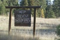 Help prevent forest fires sign Royalty Free Stock Photo
