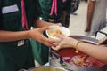 Help serving free food to the poor Needy : concept Sharing Food With Homeless