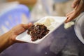 Help serving free food to the poor Needy : concept Sharing Food With Homeless