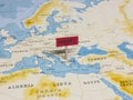 `HELP!` Sign with Pole on Greece of the World Map