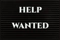 Help Wanted concept on a black board Royalty Free Stock Photo