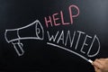 Help Wanted Concept Written On Blackboard