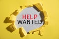 Help Wanted message on torn paper Royalty Free Stock Photo