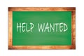 HELP  WANTED text written on green school board Royalty Free Stock Photo