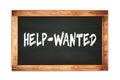 HELP-WANTED text written on wooden frame school blackboard Royalty Free Stock Photo