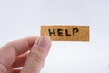 Help word on a piece paper Royalty Free Stock Photo