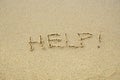 HELP! written on sand