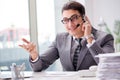 The helpdesk operator talking on phone in office Royalty Free Stock Photo