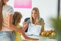 Dietitian holding the chock, preparing healthy diet plan for her patients Royalty Free Stock Photo