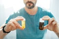 Helpful difference pills being in jars Royalty Free Stock Photo