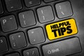 Helpful Tips text button on keyboard, concept background Royalty Free Stock Photo