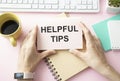 Helpful tips text write on paper as background Royalty Free Stock Photo