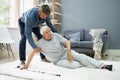 Helping Elder Senior Fallen Man Royalty Free Stock Photo