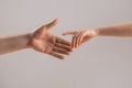 Helping hand concept, support. Helping hand outstretched. Man and children hands reach toward each other. Child and Royalty Free Stock Photo