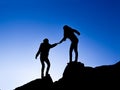 helping hand between two climber Royalty Free Stock Photo
