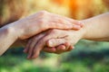 Helping hands for aged people, rehabilitation, hospice and nursing home care, service, elderly people care concept Royalty Free Stock Photo