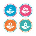 Helping hands icons. Medical health insurance. Royalty Free Stock Photo