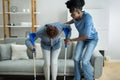 Helping Injured Handicapped African Woman