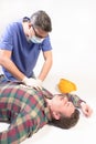 Helping injured man Royalty Free Stock Photo