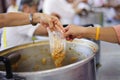 Helping the poor to enjoy eating delicious food Royalty Free Stock Photo