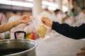 Helping the poor to enjoy eating delicious food Royalty Free Stock Photo