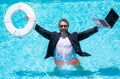 Helping summer business. Businessman in suit hold laptop and lifebuoy in sea beach water. Rescue businessman. Helping Royalty Free Stock Photo