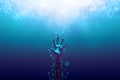 A helpless drowning hand. Royalty Free Stock Photo