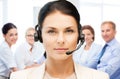 Helpline operator with headphones in call centre Royalty Free Stock Photo