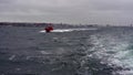 Helsinborg/Sweden -12.16.2019: pilot boat is approaching to cargo vessel Optimar. Pilot embarked on board for pilotage to port