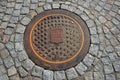 Helsingborg, Sweden: manhole on the road of stone on the street