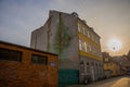 Helsingor, Denmark: Beautiful graffiti on the wall. Hamlet with Shakespeare`s skull. Street view with colorful buildings in Royalty Free Stock Photo