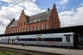 Helsingor train station with a train and a brick building in Denmark Royalty Free Stock Photo