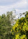 Helsinki cathedral in heatwaves behind trees in summer Royalty Free Stock Photo