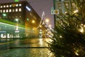 Helsinki city tram on Aleksanterikatu street on wet December evening