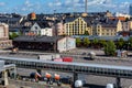 Helsinki cityscape with funny graffiti on the wall and many black city roofs