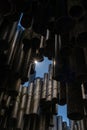 Abstract close up view of the Sibelius Monument in Helsinki with a sun star peeking through