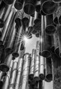 Abstract close up view of the Sibelius Monument in Helsinki with a sun star peeking through