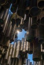 Abstract close up view of the Sibelius Monument in Helsinki with a sun star peeking through