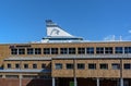 Olympia Terminal building of Port of Helsinki with Silja Line ferry`s funnel