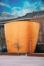 Helsinki, Finland. Bright Blue Cloudy Sky Above Kamppi Chapel Also Known As Chapel Of Silence Located On Narinkka Square