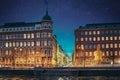 Helsinki, Finland. Bright Blue Starry Sky Above Crossroad Of Pohjoisranta And Kirkkokatu Street In Evening Or Night Royalty Free Stock Photo