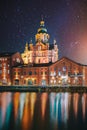 Helsinki, Finland. Bright Starry Rotation Sky. View Of Kanavaranta Street With Uspenski Cathedral In Evening Night